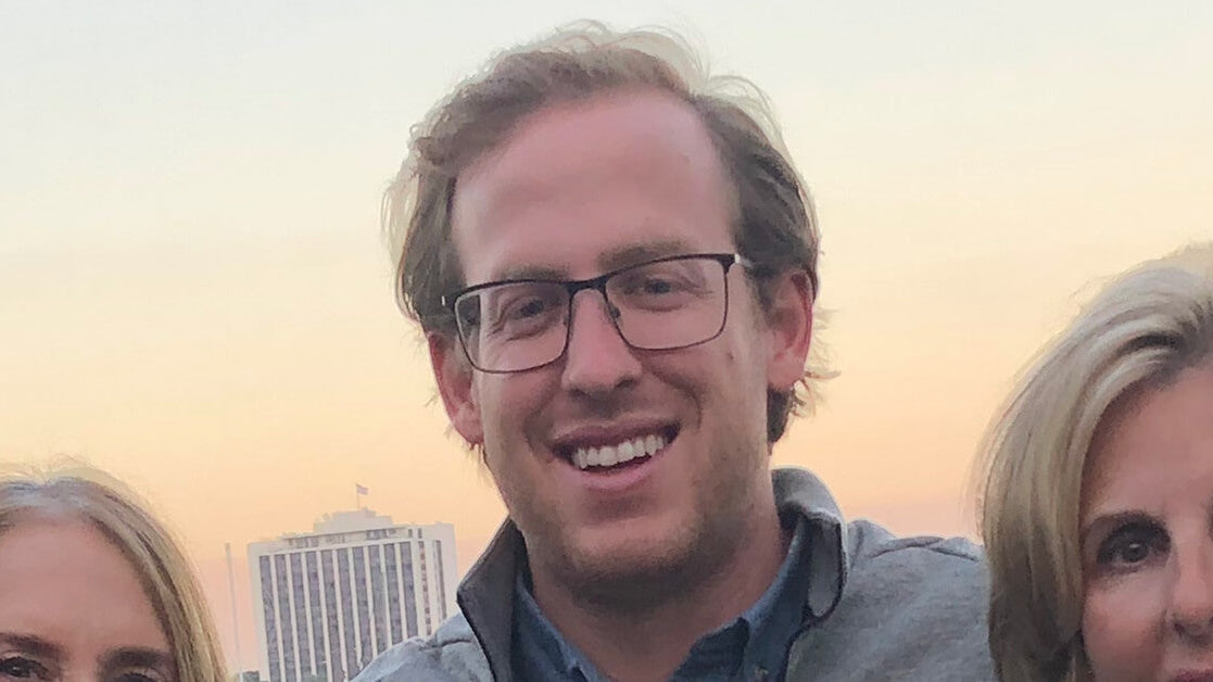 Charlie aka El Chuckerino smiling with his hair noticeably starting to look very thin